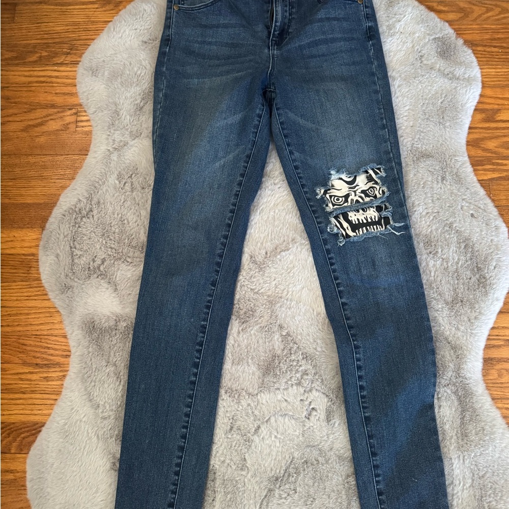 Women's Lurking Class Blue Jeans with Skull Patch